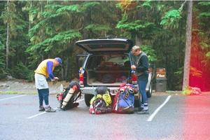 Don and Rick load their packs